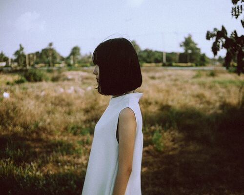 asian-brunette-female-looking-away